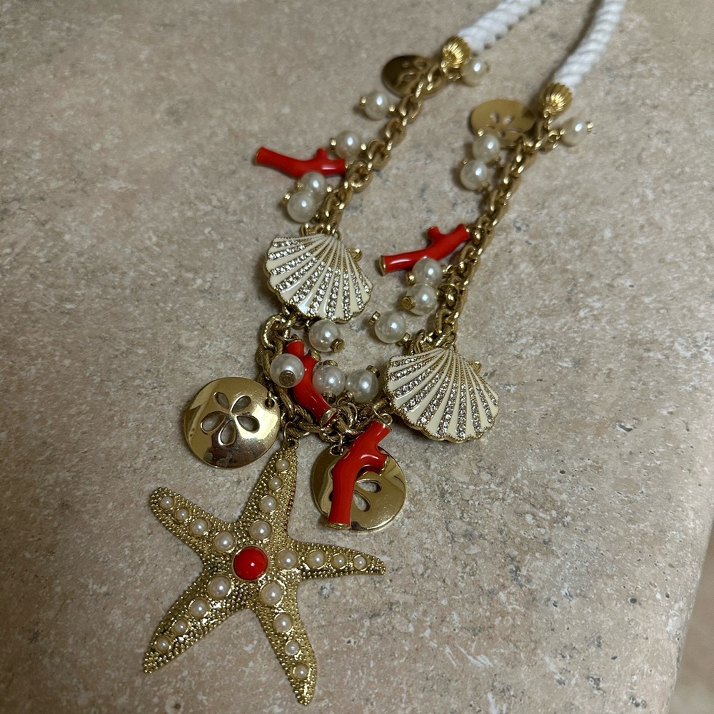 Lilly Pulitzer Gold and Red Charm Necklace with Intricate Design